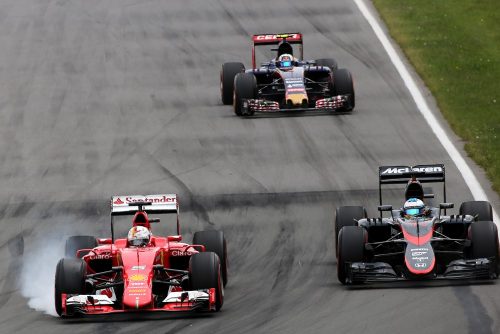 Formula One World Championship 2015, Round 7, Canadian Grand Prix, Montreal, Canada, Sunday 7 June 2015 - Sebastian Vettel (GER), Scuderia Ferrari, Fernando Alonso (ESP), McLaren Honda